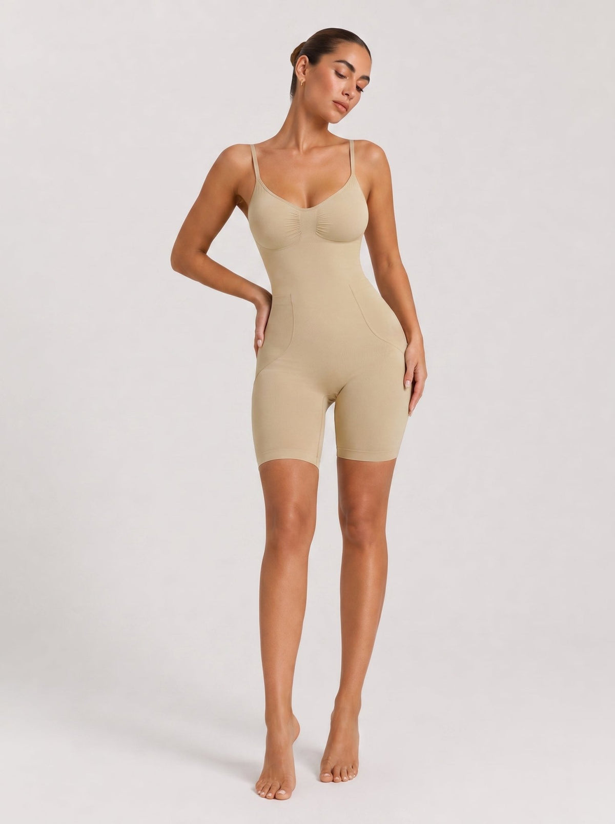 YUCOLEN Women's Seamless Tummy Control Bodysuit with Back Pull-Down Design in Light Apricot