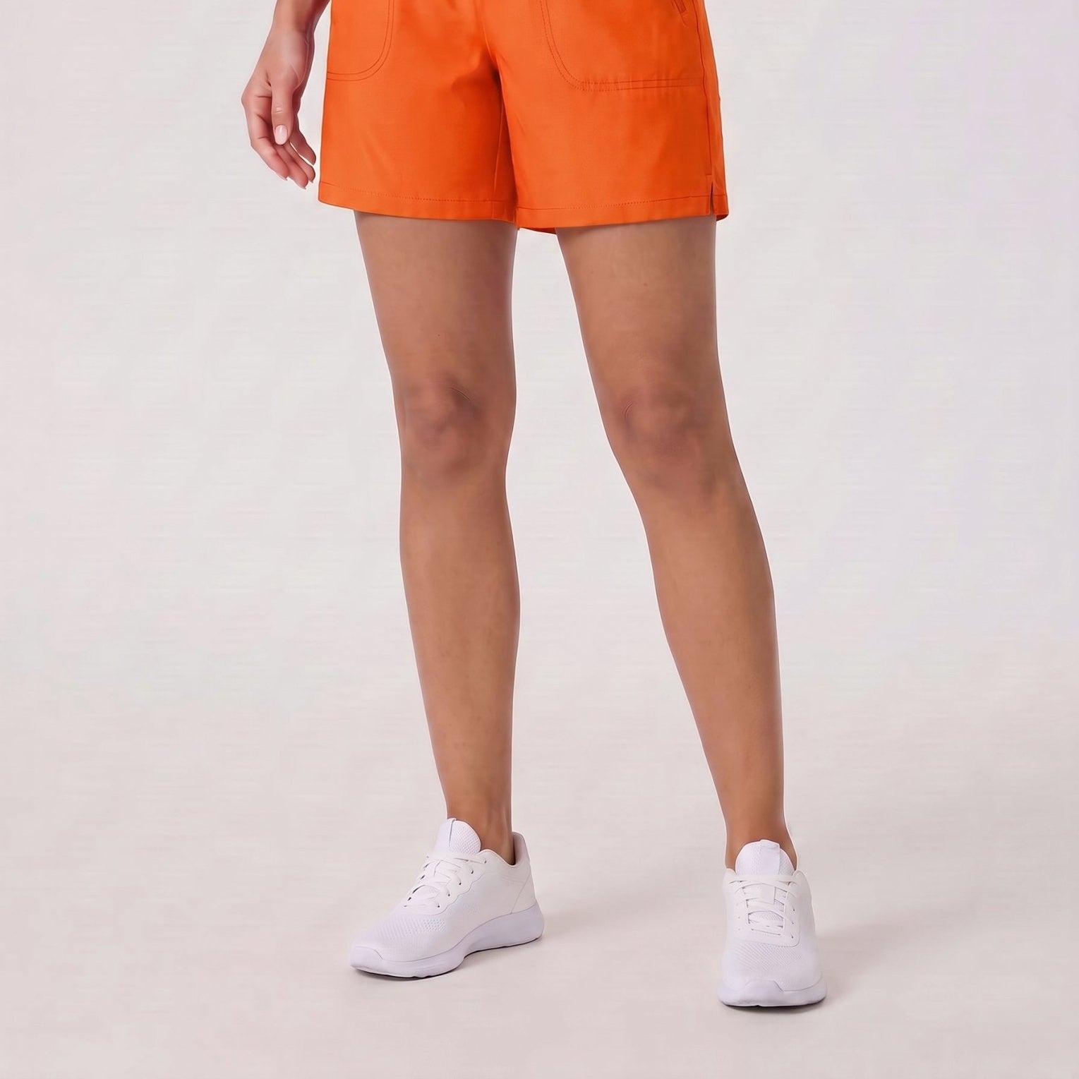 YUCOLEN Women 5 Inch Water Resistant Hiking Shorts UPF 50 Plus Quick Dry Golf Shorts with Zipper Pockets in Orange