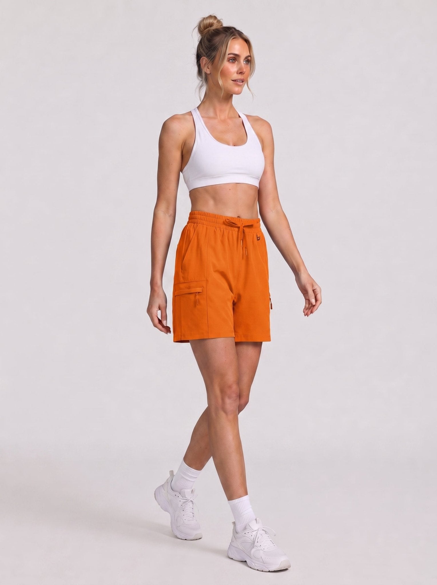 YUCOLEN Women's Quick Dry Hiking Cargo Shorts UPF 50 Plus Lightweight 5 Inch Athletic Shorts in Orange