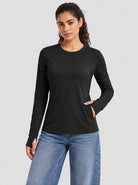 YUCOLEN Womens Thermal Running Top with Thumb Holes and Zip Pocket in Black