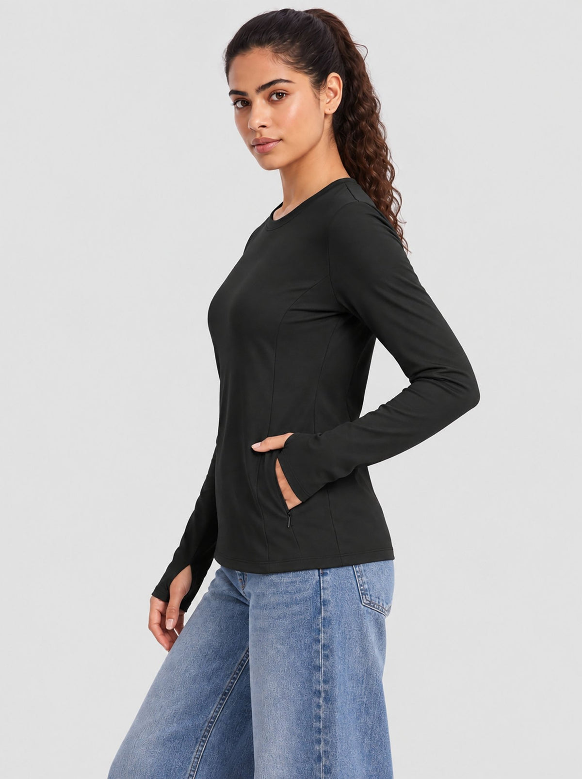 YUCOLEN Womens Thermal Running Top with Thumb Holes and Zip Pocket in Black
