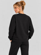 YUCOLEN Womens Warm Fleece Crewneck Sweatshirt with Zip Pockets in Black