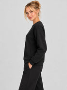 YUCOLEN Womens Warm Fleece Crewneck Sweatshirt with Zip Pockets in Black