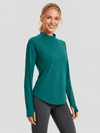 YUCOLEN Women's Thermal Fleece Lined Mock Neck Shirt with Thumb Holes in Emerald Green