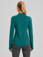 YUCOLEN Women's Thermal Fleece Lined Mock Neck Shirt with Thumb Holes in Emerald Green