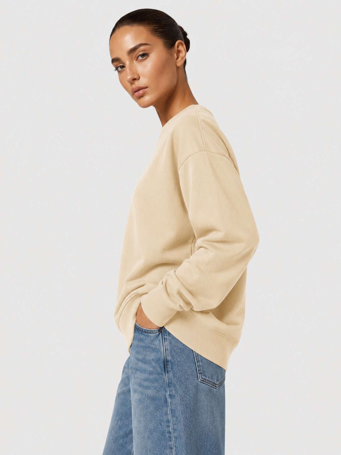 YUCOLEN Women's Fleece Lined Crewneck Sweatshirt with Thumb Holes Loose Fit Pullover in Light Apricot
