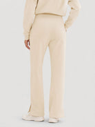 YUCOLEN Women's Fleece Lined Wide Leg Sweatpants Thermal Cotton Lounge Pants with Side Slits in Light Apricot