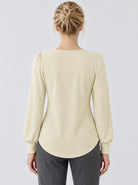 YUCOLEN Womens Pleated Puff Sleeve Crew Neck Long Sleeve Tunic Top in Light Apricot