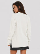YUCOLEN Women's Oversized Ribbed Knit Turtleneck Pullover with Side Slit in Light beige