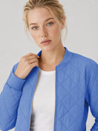 YUCOLEN Women's Lightweight Diamond Quilted Bomber Jacket with Secure Zip Pockets in Light Blue