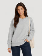 YUCOLEN Women's Fleece Lined Crewneck Sweatshirt with Thumb Holes Loose Fit Pullover in Light Grey