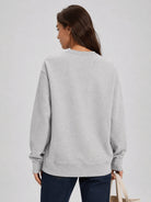 YUCOLEN Women's Fleece Lined Crewneck Sweatshirt with Thumb Holes Loose Fit Pullover in Light Grey