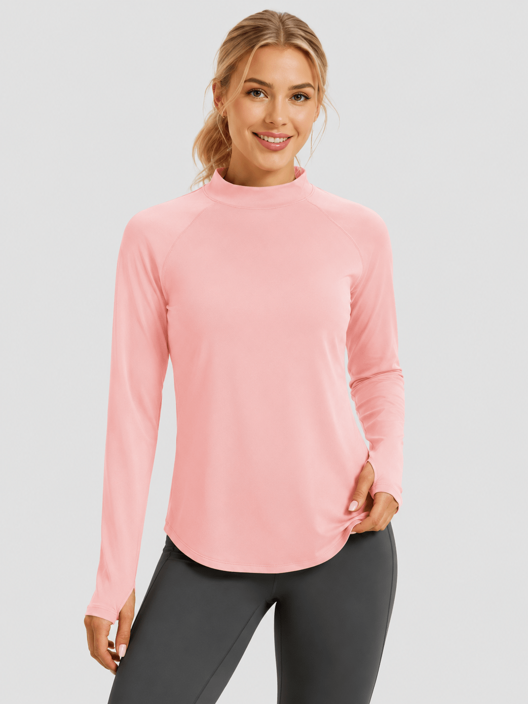 YUCOLEN Women's Thermal Fleece Lined Mock Neck Shirt with Thumb Holes in Light Pink