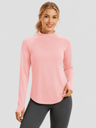 YUCOLEN Women's Thermal Fleece Lined Mock Neck Shirt with Thumb Holes in Light Pink