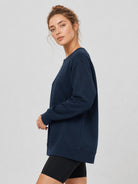 YUCOLEN Women's Fleece Lined Crewneck Sweatshirt with Thumb Holes Loose Fit Pullover in Navy