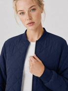 YUCOLEN Women's Lightweight Diamond Quilted Bomber Jacket with Secure Zip Pockets in Navy