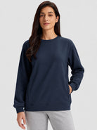 YUCOLEN Womens Warm Fleece Crewneck Sweatshirt with Zip Pockets in Navy
