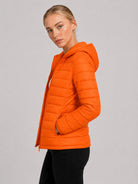 YUCOLEN Women Lightweight Hooded Jacket Water-Resistant Quilted Outdoor Coat in Orange
