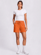 YUCOLEN Women's 5 Inch Quick Dry Hiking Cargo Shorts UPF 50 Plus Lightweight Athletic Shorts in Orange
