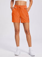 YUCOLEN Women's 5 Inch Quick Dry Hiking Cargo Shorts UPF 50 Plus Lightweight Athletic Shorts in Orange