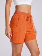 YUCOLEN Women's 5 Inch Quick Dry Hiking Cargo Shorts UPF 50 Plus Lightweight Athletic Shorts in Orange
