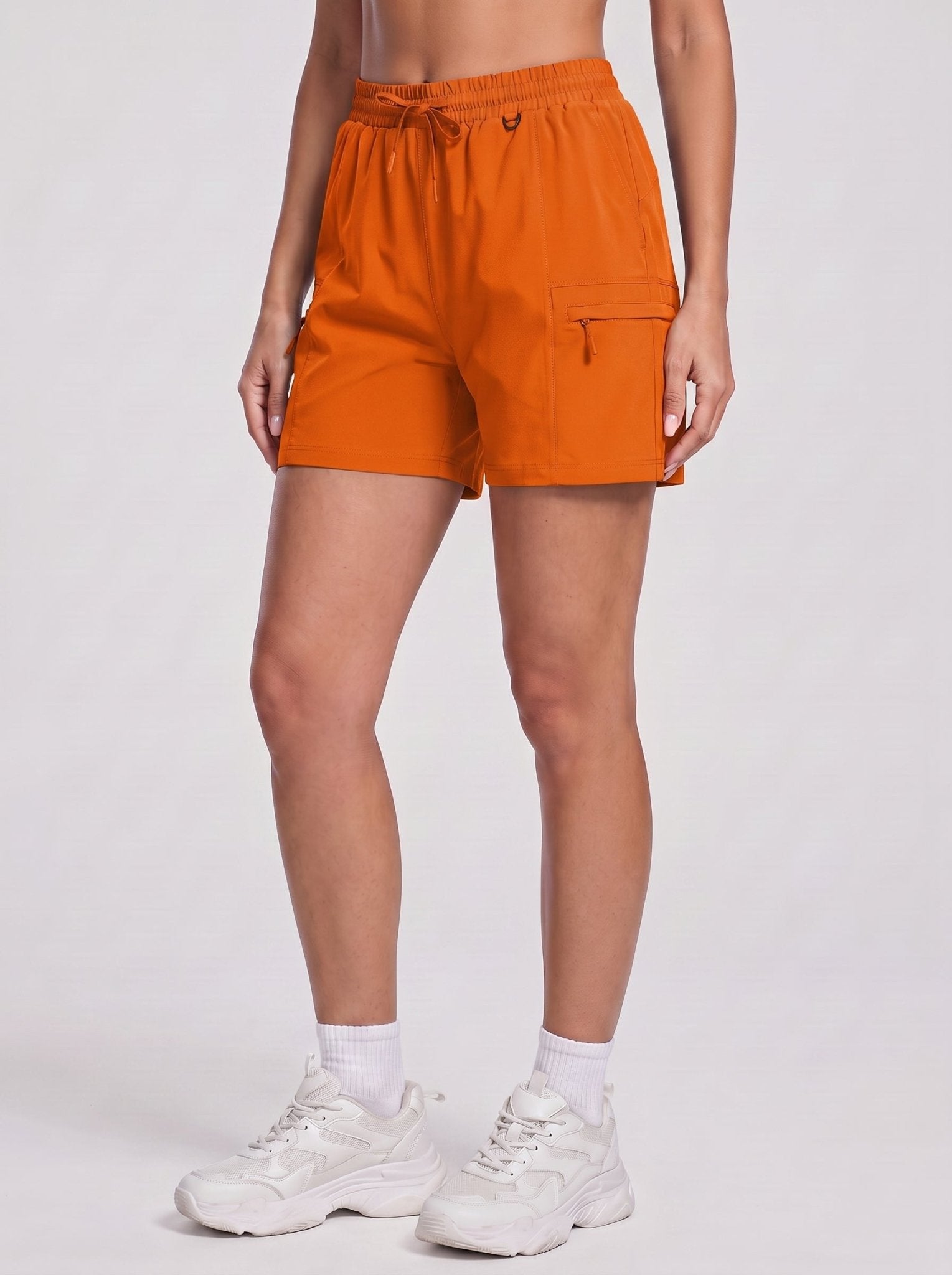 YUCOLEN Women's Quick Dry Hiking Cargo Shorts UPF 50 Plus Lightweight 5 Inch Athletic Shorts in Orange
