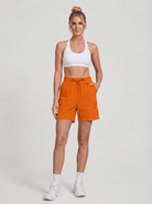 YUCOLEN Women's Quick Dry Hiking Cargo Shorts UPF 50 Plus Lightweight 5 Inch Athletic Shorts in Orange