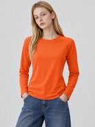 YUCOLEN Women’s Stretch Thermal Long Sleeve Active Top in Orange