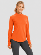 YUCOLEN Women's Thermal Fleece Lined Mock Neck Shirt with Thumb Holes in Orange