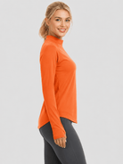 YUCOLEN Women's Thermal Fleece Lined Mock Neck Shirt with Thumb Holes in Orange