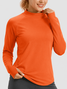 YUCOLEN Women's Thermal Fleece Lined Mock Neck Shirt with Thumb Holes in Orange