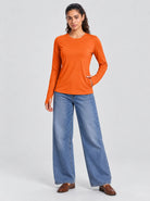 YUCOLEN Womens Thermal Running Top with Thumb Holes and Zip Pocket in Orange