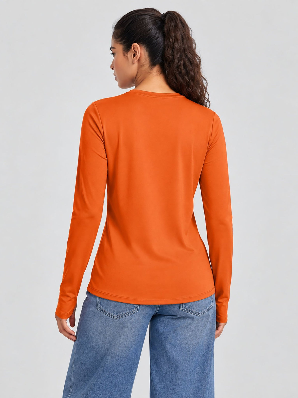 YUCOLEN Womens Thermal Running Top with Thumb Holes and Zip Pocket in Orange