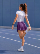 YUCOLEN Women High Waisted Pleated Tennis Skort - Pickleball Golf Skirt with Pockets in Purple Red