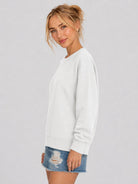 YUCOLEN Women's Fleece Lined Crewneck Sweatshirt with Thumb Holes Loose Fit Pullover in White