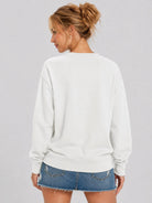 YUCOLEN Women's Fleece Lined Crewneck Sweatshirt with Thumb Holes Loose Fit Pullover in White