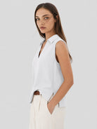 YUCOLEN Women's Sleeveless Golf Polo Shirt UPF 50+ V Neck Side Slit Sun Protection Top in White