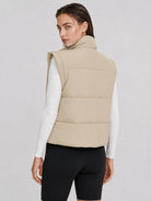 YUCOLEN Women's Cropped Puffer Vest Lightweight Windproof Insulated Gilet with Pockets in Light Champagne