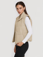 YUCOLEN Women's Cropped Puffer Vest Lightweight Windproof Insulated Gilet with Pockets in Light Champagne