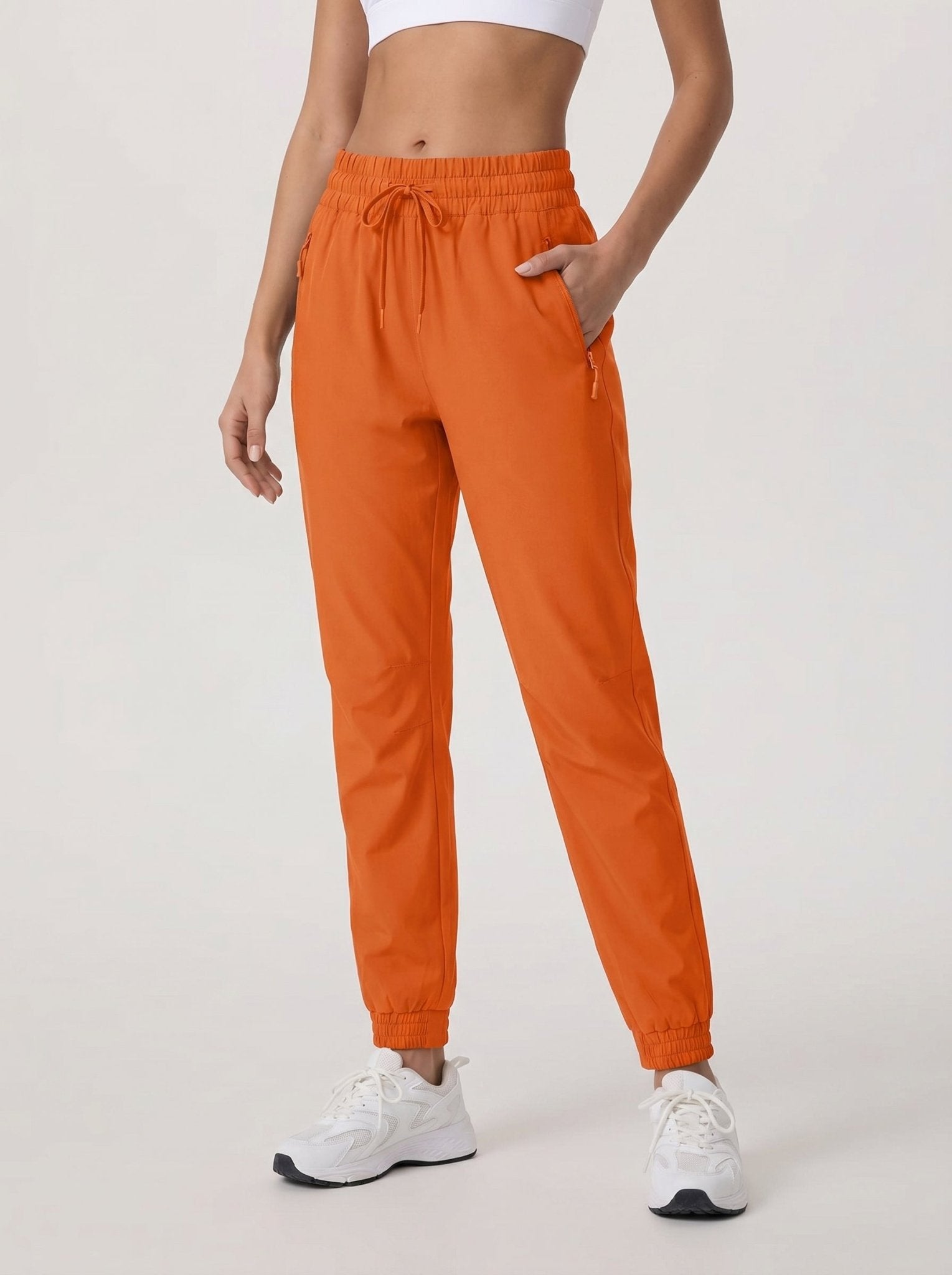 YUCOLEN Women's Lightweight Quick Dry Hiking Pants Water Resistant Outdoor Joggers in Orange