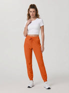 YUCOLEN Women's Lightweight Quick Dry Hiking Pants Water Resistant Outdoor Joggers in Orange