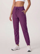 YUCOLEN Women's Lightweight Quick Dry Hiking Pants Water Resistant Outdoor Joggers in Purple Red