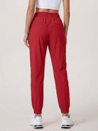 YUCOLEN Women's Lightweight Quick Dry Hiking Pants Water Resistant Outdoor Joggers in Tomato Red